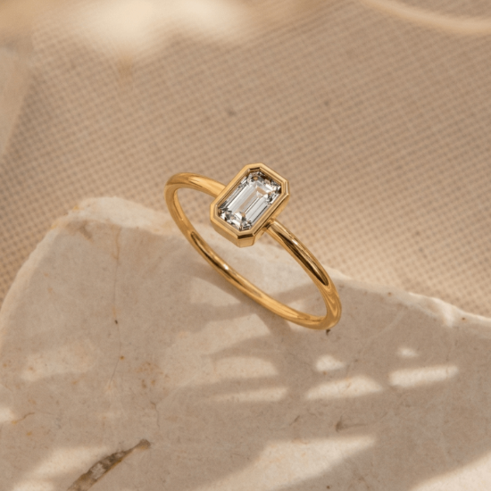Aurlet Minimal Solitaire Ring with Emerald Cut Stone in Solid Yellow Gold